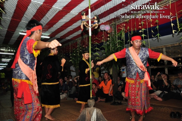Bidayuh dancers performing at a Harvest Festival gathering known as 'Gawai Dayak'