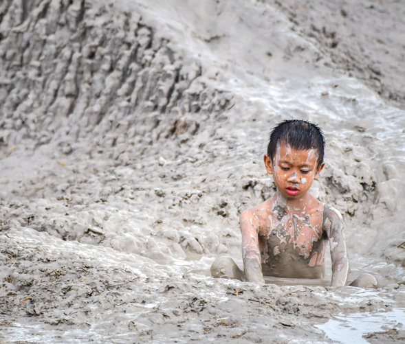 playing in Meritam volcanic mud